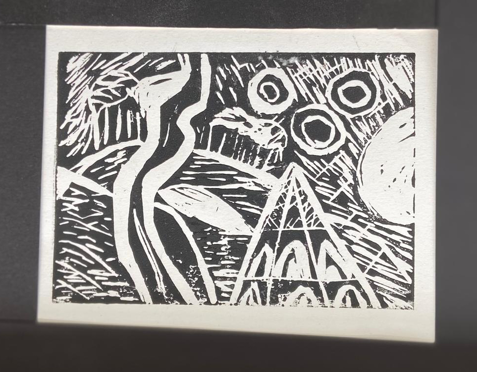 a black and white Lino cut print, it is a stylised image of a roman temple on Chanctonbury Ring, a hill fort in West Sussex