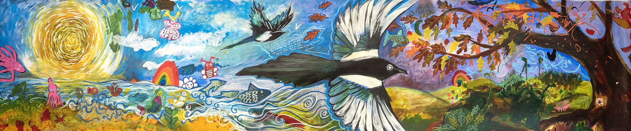 A painting of two magpies flying across a late summer scene, the sea is on the left of the image and an oak tree is on the right